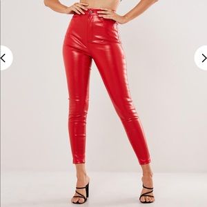 Red faux leather pants